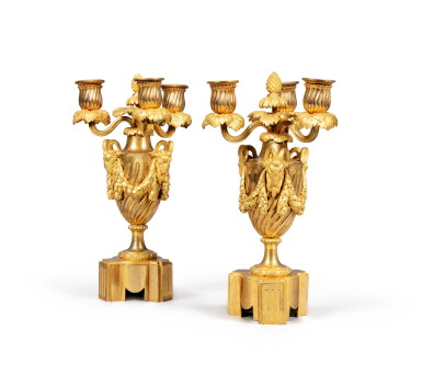 View full screen - View 1 of Lot 142. A pair of gilt-bronze three-light candelabra, Louis XV, vers 1750 | Paire de candélabres au vase à trois lumières en bronze doré d'époque Louis XV, vers 1750.