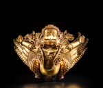 A gilt-copper repoussé figure of Garuda, Tibet, circa 15th century | 約十五世紀 藏傳鎏金銅捶揲迦樓羅坐像