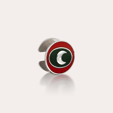 View full screen - View 1 of Lot 398. A white gold and enamel lapel pin depicting a crescent moon with the colours of the Standard of the Sultan of Oman made for H.M. Qaboos bin Said | Circa 1975.