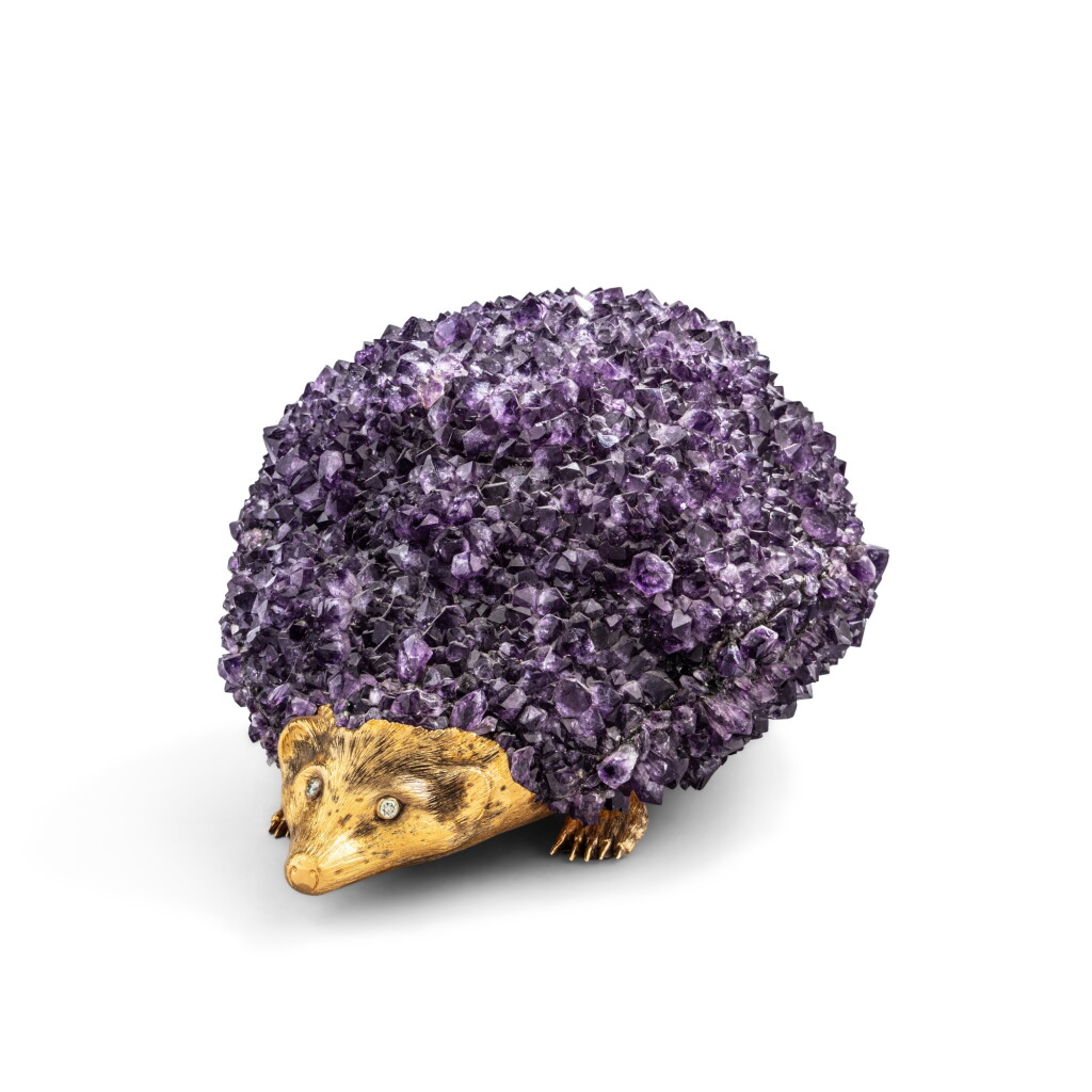 View full screen - View 1 of Lot 587. An amethyst figure of a hedgehog with silver-gilt mounts, probably Idar-Obarstein, late 20th century.