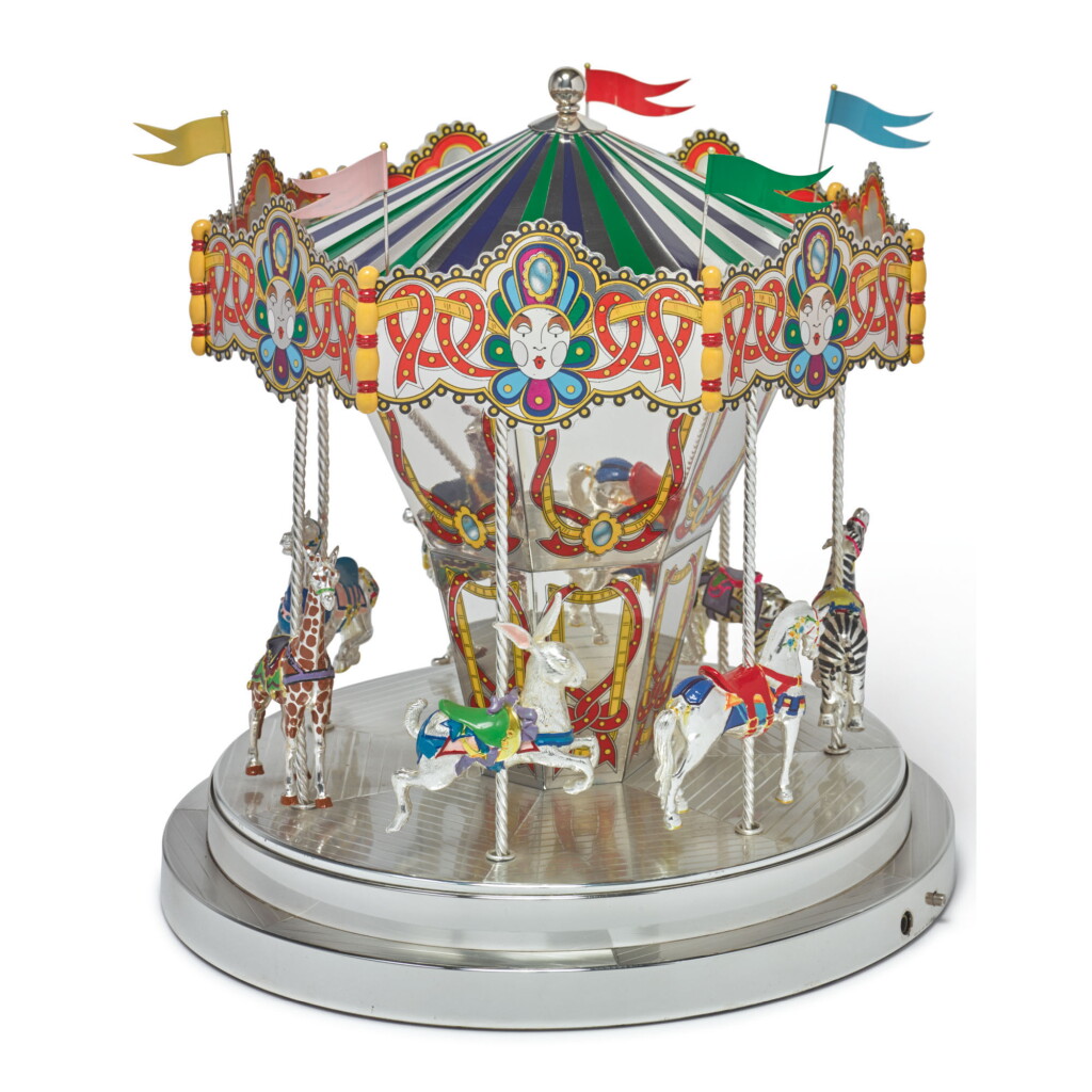 View full screen - View 1 of Lot 1852. A SILVER AND ENAMEL CAROUSEL, DESIGNED BY GENE MOORE FOR TIFFANY & CO., NEW YORK, CIRCA 1990.