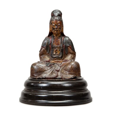 View full screen - View 1 of Lot 259. A lacquered bronze figure of Guanyin Qing dynasty, 17th-18th | 清十七至十八世紀 漆金铜觀音坐像.