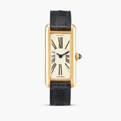 View full screen - View 1 of Lot 2386. Mini Tank J.J.C. | A yellow gold rectangular wristwatch with original gold deployant buckle, Circa 1970-71.