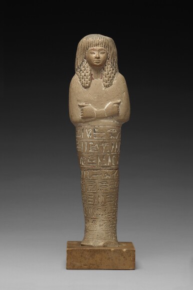 View full screen - View 1 of Lot 404. An Egyptian Polychrome Limestone Ushabti of Neb-mehyt (Nebmehite), 19th Dynasty, 1292-1190 B.C..