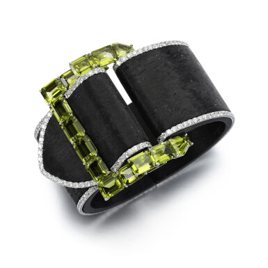 View full screen - View 1 of Lot 72. Carbon fibre, white gold, diamond and peridot cuff bracelet, 'Belt'.