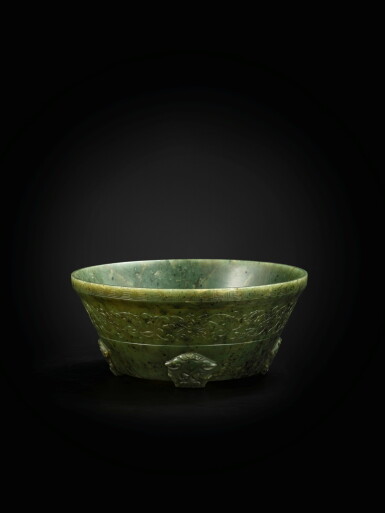 View full screen - View 1 of Lot 113. A spinach-green jade bowl Qing Dynasty, 18th century | 清十八世紀 碧玉纏枝蓮花紋盌.