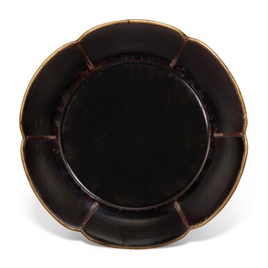 View full screen - View 1 of Lot 3606. A black lacquer mallow-shaped dish Song dynasty | 宋 烏漆葵式盤.