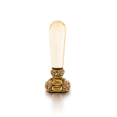 View full screen - View 1 of Lot 1143. A gold-mounted citrine hand seal, probably English, second quarter 19th century.