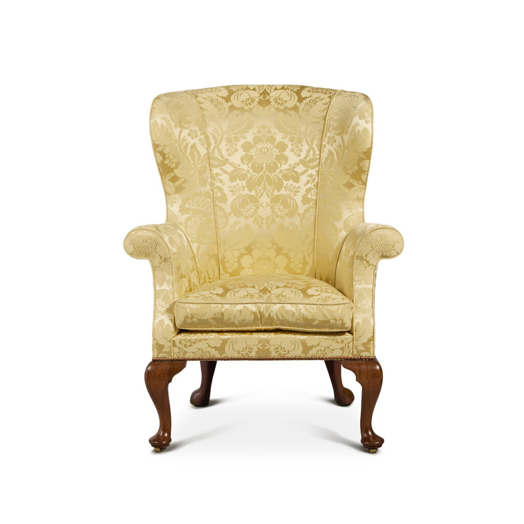 View full screen - View 1 of Lot 205. A George I Upholstered Walnut Wing Armchair, Early 18th Century.