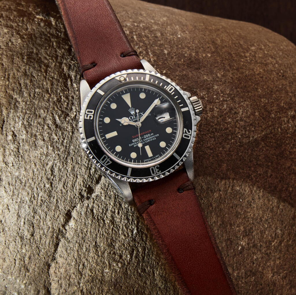 View full screen - View 1 of Lot 41. Reference 1680 'Red' Submariner, A stainless steel automatic wristwatch with date, Circa 1973.
