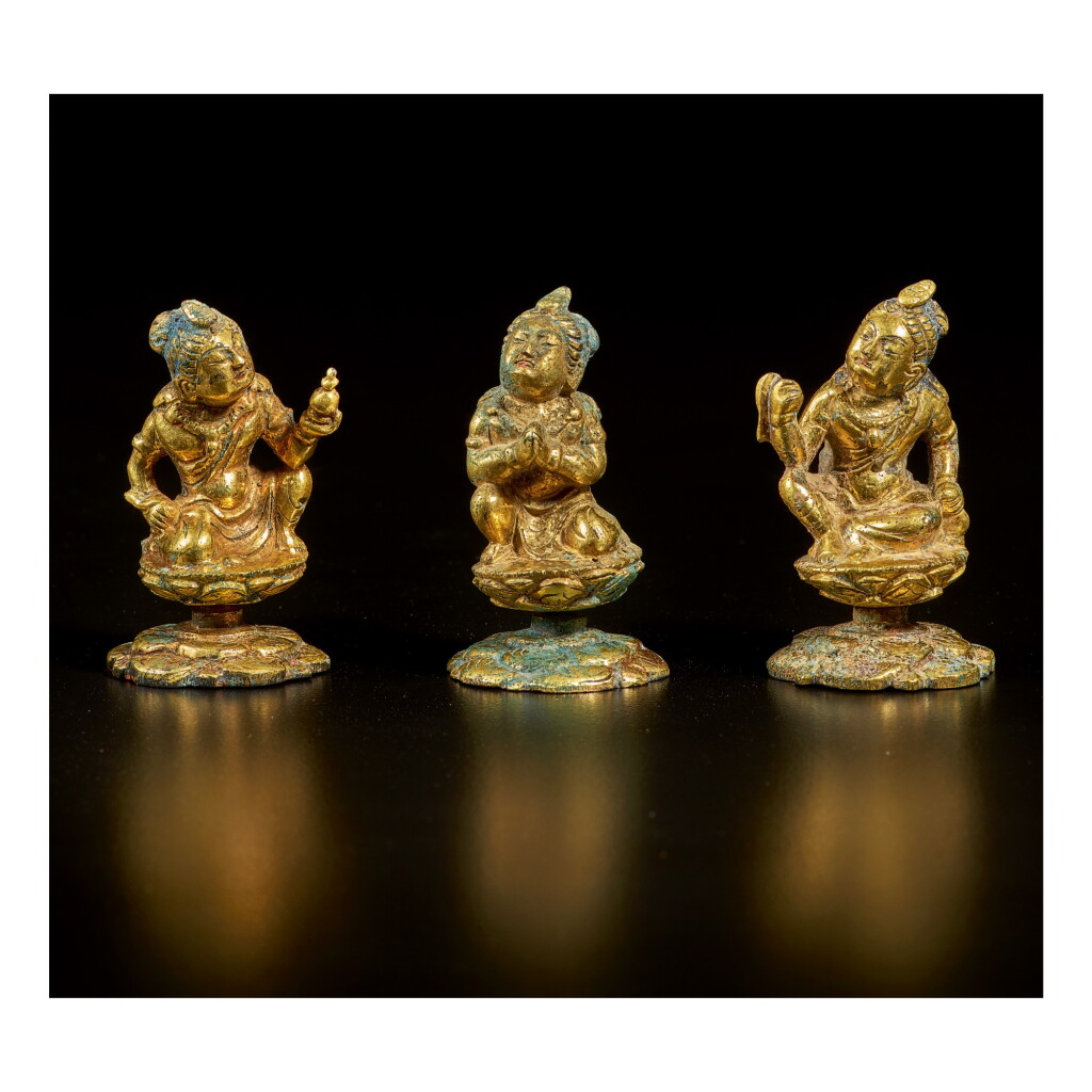 View full screen - View 1 of Lot 600. THREE SMALL GILT-BRONZE FIGURES OF BODHISATTVAS, TANG DYNASTY.