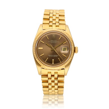 View full screen - View 1 of Lot 37. Datejust, Ref. 1601 | A yellow gold wristwatch with date and bracelet | Circa 1977.