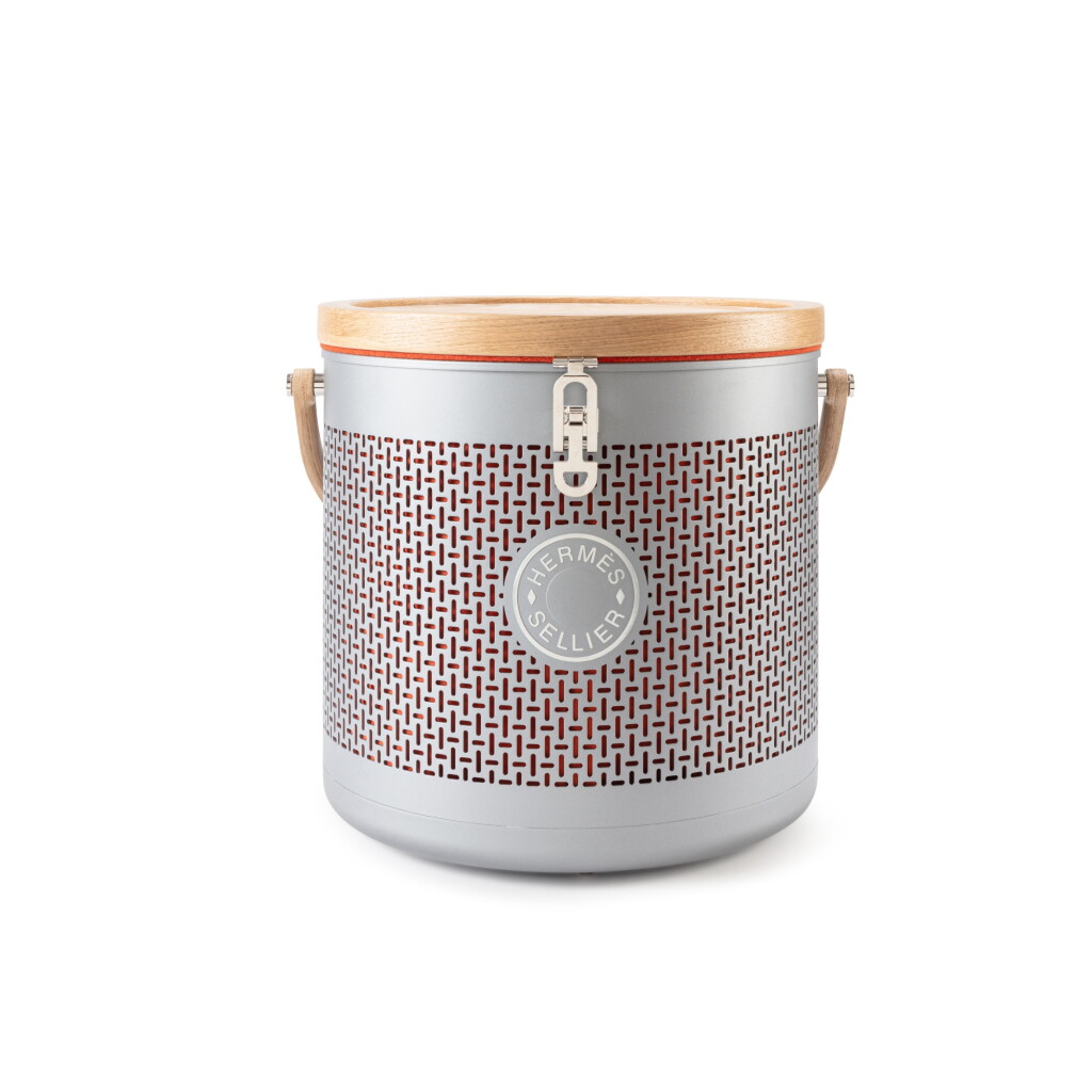 View full screen - View 1 of Lot 712. Perforated Aluminum and Oak Mini Carrou'Selle Saddle Box.