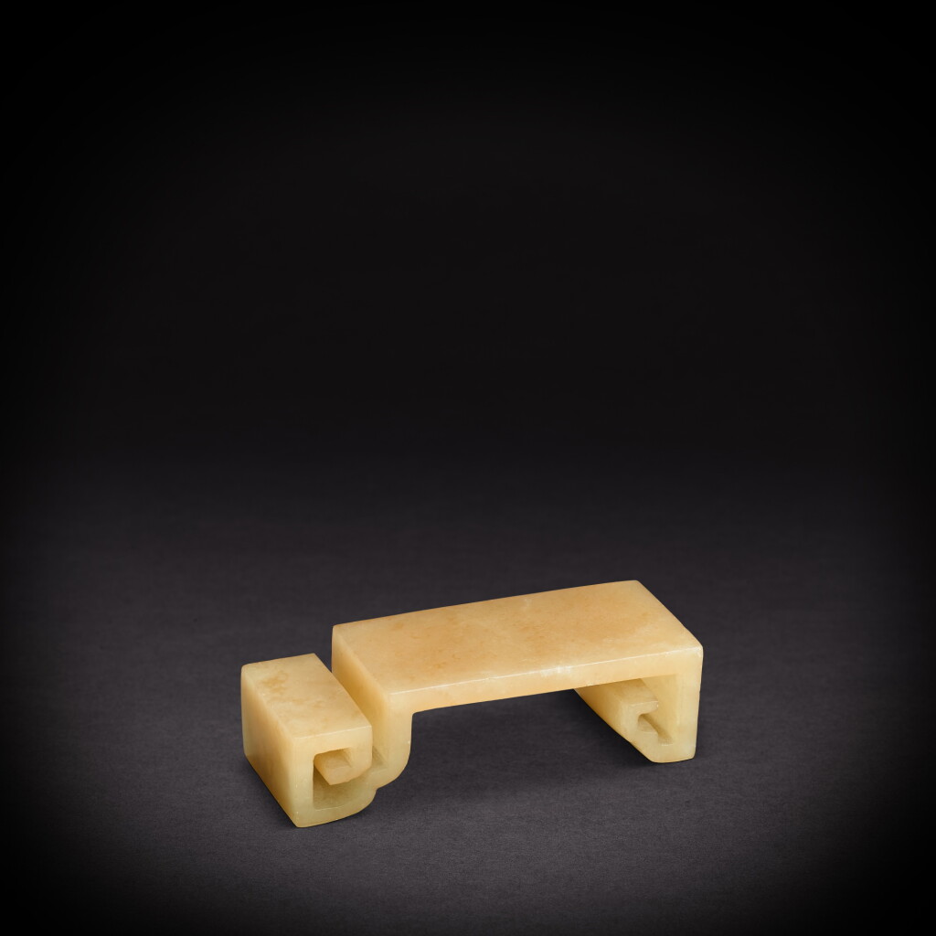 View full screen - View 1 of Lot 6935. A celadon jade 'tea table' ink rest, Qing dynasty, 18th - 19th century | 清十八至十九世紀 青玉几式墨床.