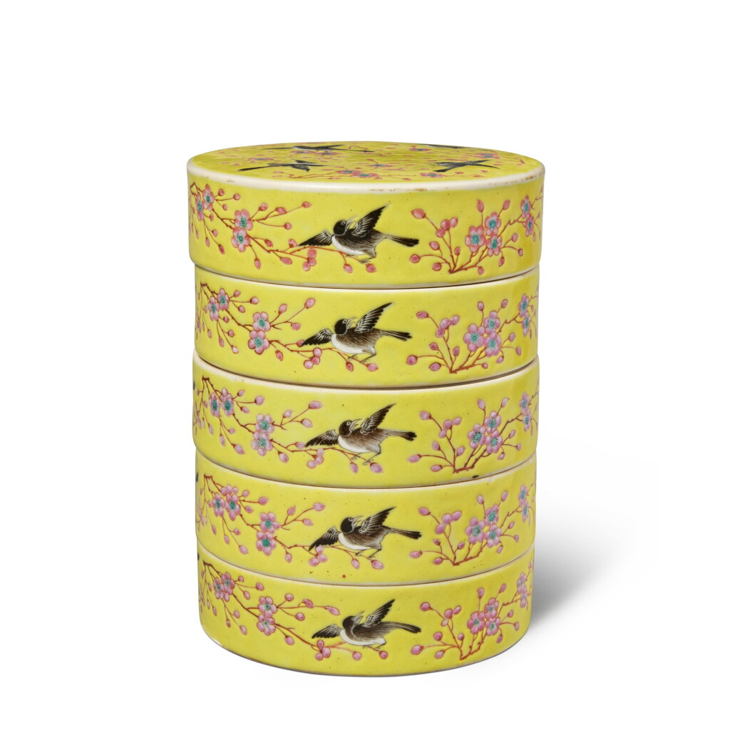 View full screen - View 1 of Lot 578. A yellow-ground famille-rose 'magpie and prunus' four-tiered box and cover, Qing dynasty, Tongzhi period | 清同治 黃地粉彩喜上眉梢紋四層蓋盒.