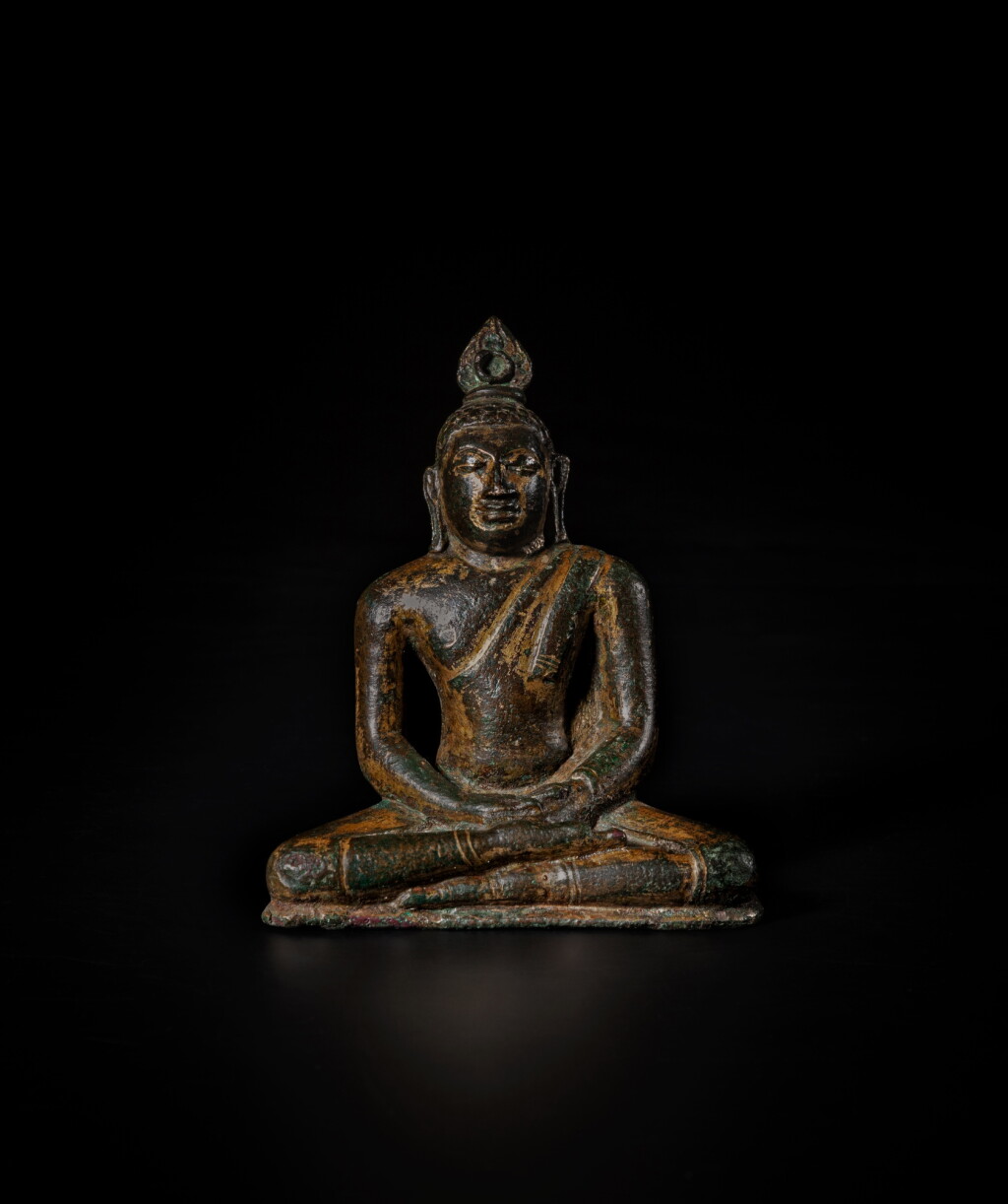 View full screen - View 1 of Lot 33. A gilt-bronze figure of Buddha, Sri Lanka, Anaradhapura style, circa 10th century | 斯里蘭卡 仿阿努拉德普勒王朝時期 約十世紀 鎏金銅佛坐像.