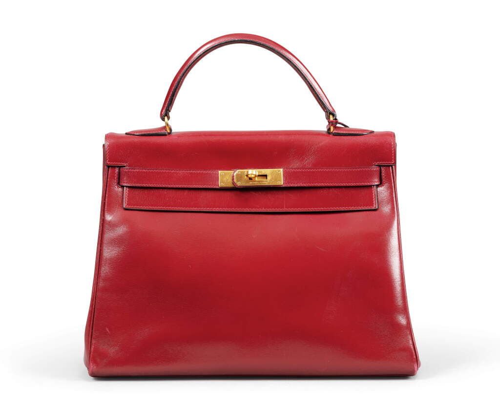View full screen - View 1 of Lot 7. Burgundy Box Leather Kelly Retourne 32 Gold Hardware, 1979.