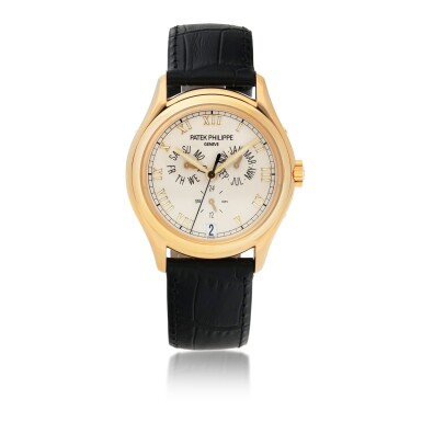 View full screen - View 1 of Lot 17. PATEK PHILIPPE | REF 5035 YELLOW GOLD ANNUAL CALENDAR WRISTWATCH WITH 24-HOUR INDICATION MADE IN 2001.
