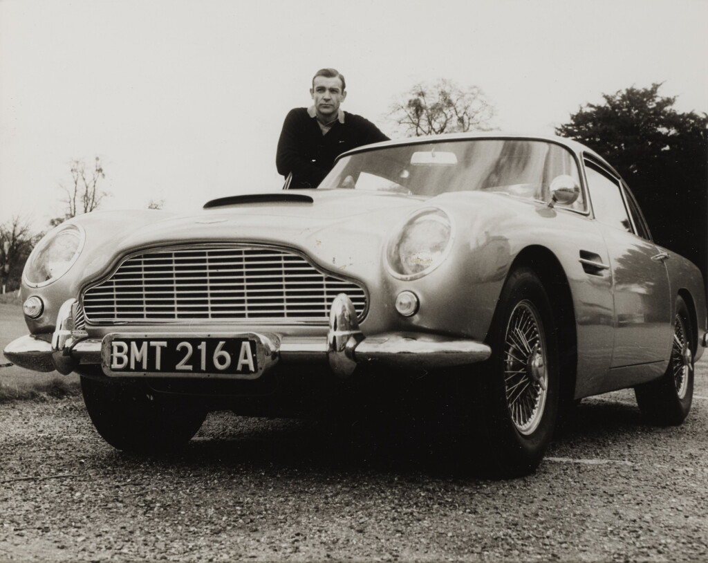 View full screen - View 1 of Lot 23. Goldfinger (1964), original photographic production still, British.