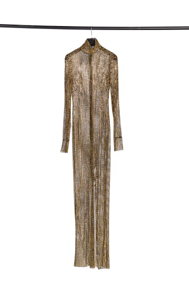 View full screen - View 1 of Lot 11. Dolce & Gabbana Long Gold Turtleneck Dress with Gold Studs, Gold-Metal Rigid Wide Corset Belt with Padlocks, and Faux-Crystal Drop DG Earrings.