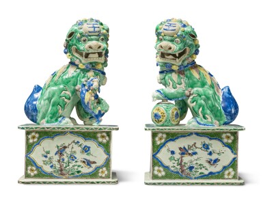 View full screen - View 1 of Lot 67. A Large Pair of Chinese Glazed-Biscuit Famille-Verte Figures of Buddhist Lions Qing Dynasty, Kangxi Period | 清康熙 素三彩佛獅一對.