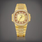 Nautilus, Reference 3800 | A yellow gold, diamond and ruby-set bracelet watch with date, Made in 1994 | 百達翡麗 | NAUTILUS 型號3800 | 黃金鑲鑽石及紅寶石鏈帶腕錶,備日期顯示,1994年製