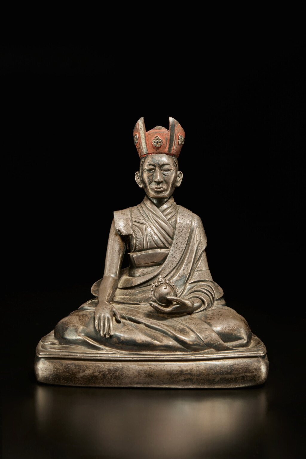 View full screen - View 1 of Lot 562. A rare silver figure of the Fifth Shamarpa, Konchok Yanglak, Tibet, 17th century.