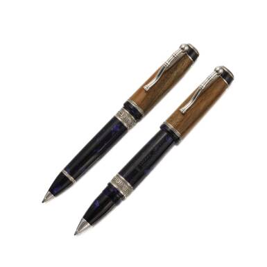 View full screen - View 1 of Lot 144. DELTA | A LIMITED EDITION SET OF TWO WRITING INSTRUMENTS CONSISTING OF A BLUE MARBLED RESIN AND WOOD BALLPOINT AND ROLLERBALL PEN, CIRCA 2000 .