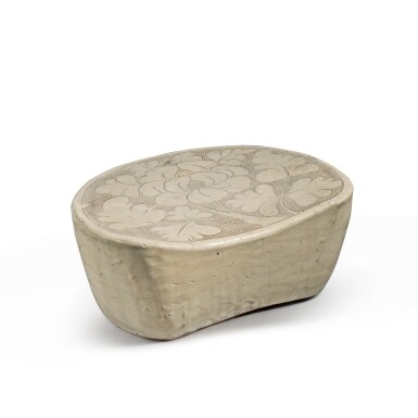 View full screen - View 1 of Lot 130. A 'Cizhou' sgraffiato 'peony' pillow, Northern Song dynasty | 北宋 磁州窰白釉珍珠地劃牡丹紋枕.