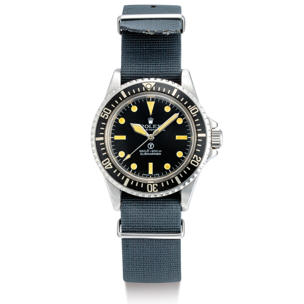 View full screen - View 1 of Lot 2142. ROLEX | MILITARY SUBMARINER, REFERENCE 5517, A STAINLESS STEEL MILITARY WRISTWATCH WITH REVOLVING BEZEL, FIXED BAR LUGS AND MILITARY ENGRAVINGS, CIRCA 1977 | 勞力士 | "Military Submariner 型號5517 精鋼軍用腕錶,備迴轉錶圈及軍用印記,錶殼編號5212927,約1977年製".
