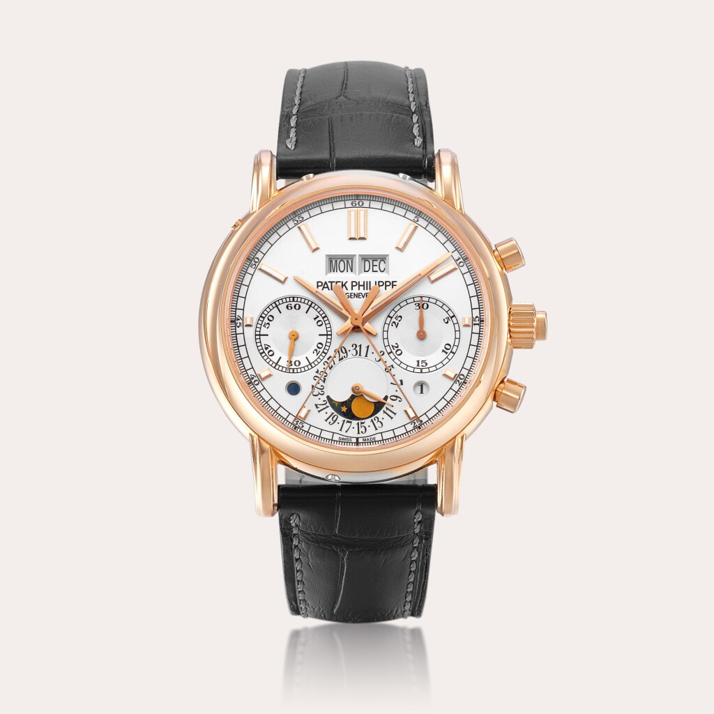 View full screen - View 1 of Lot 2309. Reference 5204 | A pink gold perpetual calendar split seconds chronograph wristwatch with moon phases, leap year and day and night indication, Circa 2017.
