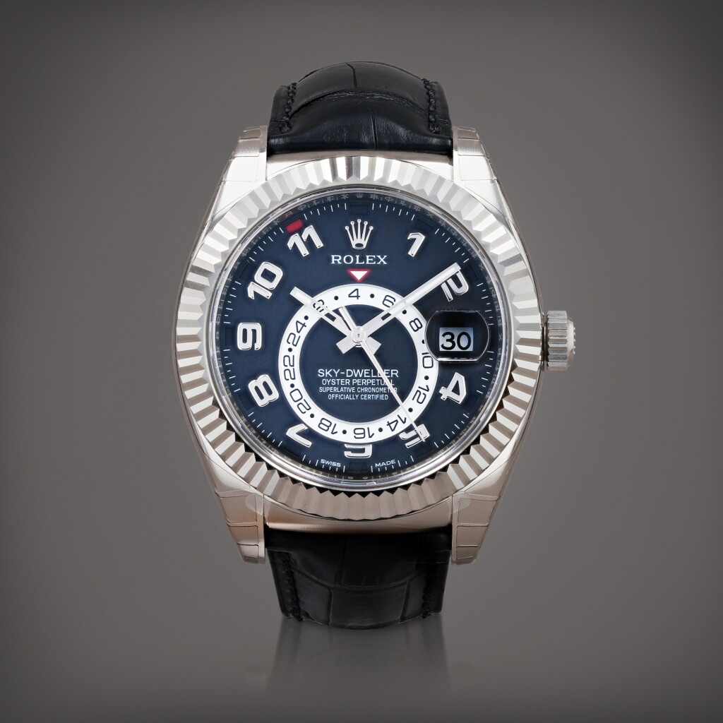 View full screen - View 1 of Lot 398. Sky-Dweller 'stickered', reference 326139 Montre bracelet en or blanc à quantième annuel, double fuseau horaire et date | White gold annual calendar and dual time zone wristwatch with date and bracelet Vers 2015 | Circa 2015.