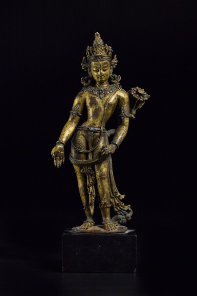 View full screen - View 1 of Lot 810. A hardstone-inlaid gilt copper figure of Padmapani, Nepal, 13th / 14th century.