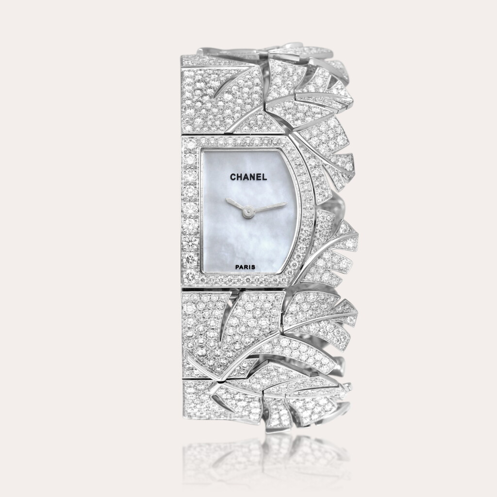 View full screen - View 1 of Lot 2137. Reference J9661 | A white gold and diamond-set bracelet watch with mother-of-pearl dial, Circa 2011.