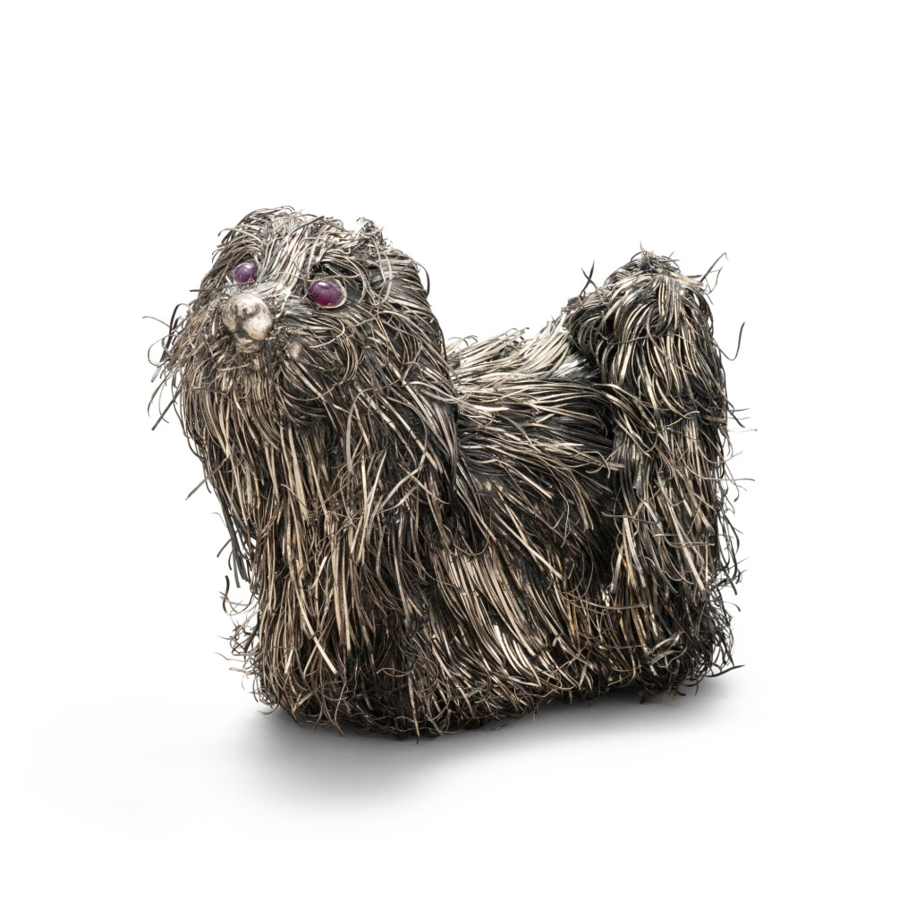 View full screen - View 1 of Lot 26. A silver Shih Tzu dog, Buccellati, Milan, circa 1980 | Chien Shih Tzu en argent par Buccellati, Milan, vers 1980.