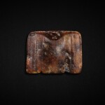 A celadon and russet jade 'eagle' pendant, Neolithic period, Hongshan culture | 新石器時代紅山文化 青玉鷹