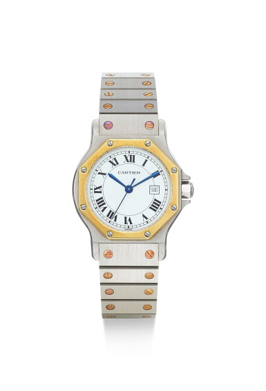 View full screen - View 1 of Lot 8152. CARTIER | SANTOS OCTAGONAL, A YELLOW GOLD AND STAINLESS STEEL WRISTWATCH WITH DATE AND BRACELET, CIRCA 1990.