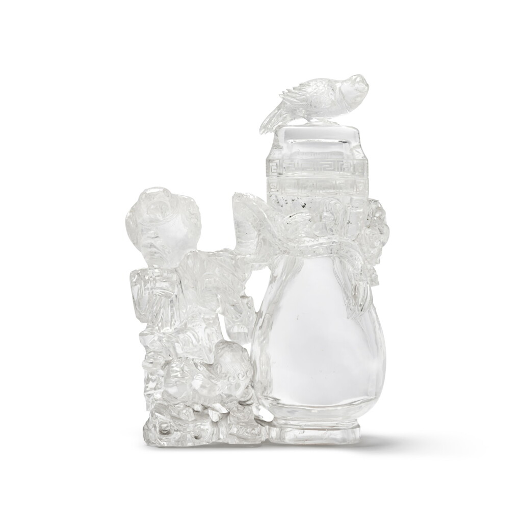 View full screen - View 1 of Lot 540. A large carved rock crystal vase and cover, Late Qing dynasty | 清末 水晶雕仙山瑞獸蓋瓶.