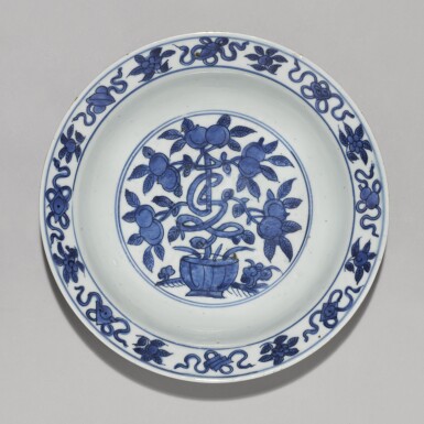 View full screen - View 1 of Lot 31. A blue and white 'peach' dish Ming dynasty, 16th century | 明十六世紀 青花桃紋折沿盤.