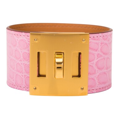 View full screen - View 1 of Lot 95. Hèrmes Bubblegum Pink (5P) Kelly Dog Bracelet of Matte Mississipiensis Alligator with Gold Hardware Size Large (T3).