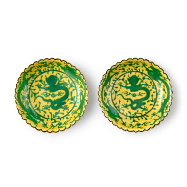 View full screen - View 1 of Lot 871. A pair of yellow-ground green-enameled 'dragon' dishes, Seal marks and period of Qianlong | 清乾隆 黃地綠彩趕珠龍紋花口小盤一對 《大清乾隆年製》款.