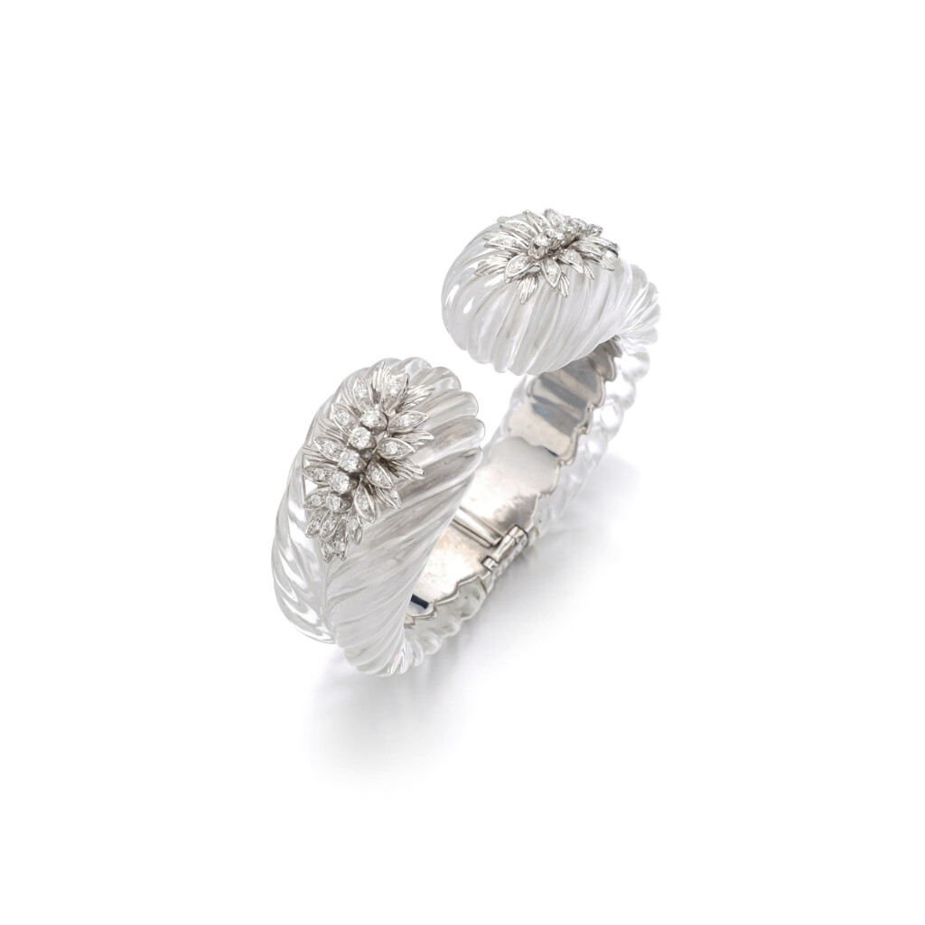 View full screen - View 1 of Lot 899. Rock crystal and diamond bangle.