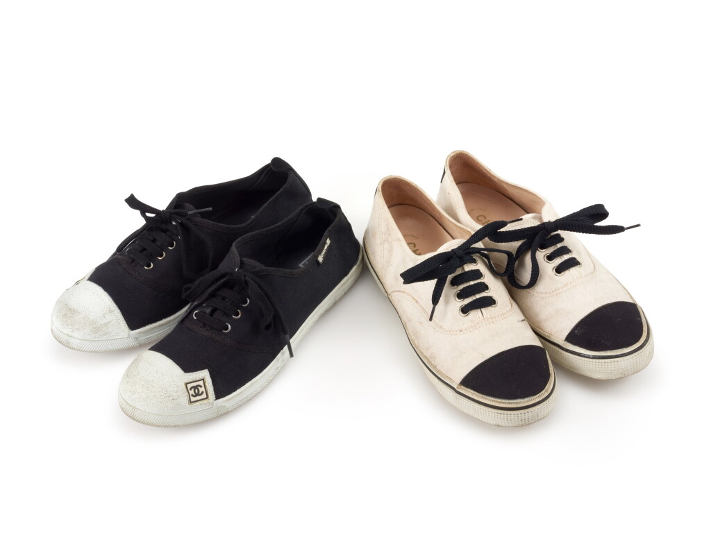 View full screen - View 1 of Lot 20. CHANEL | TWO PAIRS OF BLACK AND WHITE CANVAS SNEAKERS .