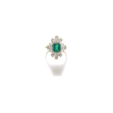 View full screen - View 1 of Lot 130. EMERALD AND DIAMOND RING.
