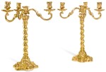 A PAIR OF EDWARDIAN SILVER-GILT FOUR-LIGHT CANDELBRA, GEORGE FOX, LONDON, 1909