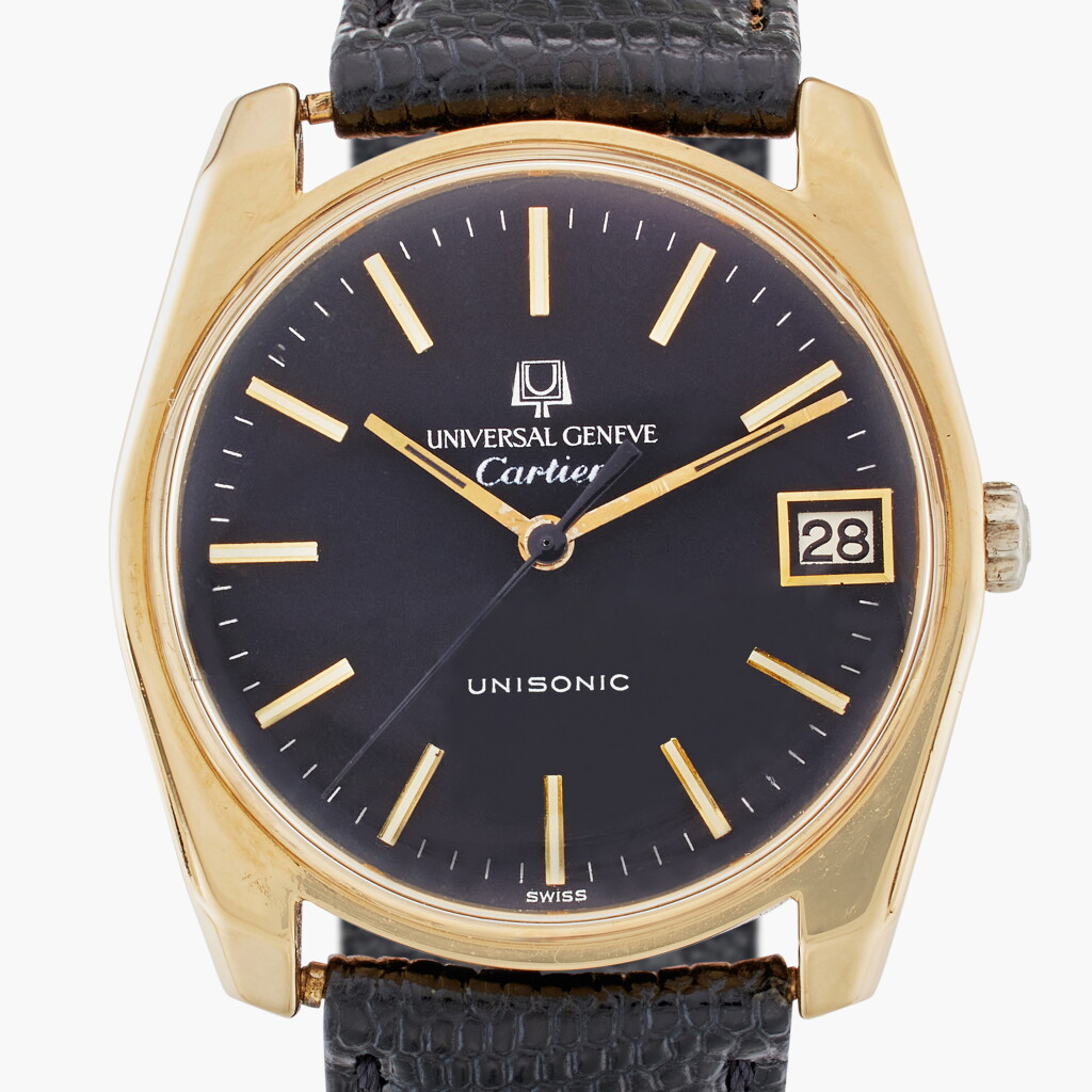 View full screen - View 1 of Lot 681. Retailed by Cartier: An 18k yellow gold wristwatch with date, Circa 1970.