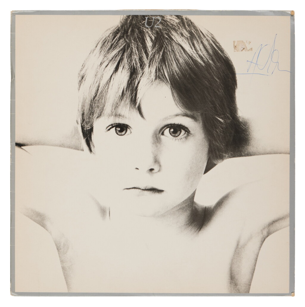 View full screen - View 1 of Lot 120. U2 | A signed copy of their debut album.