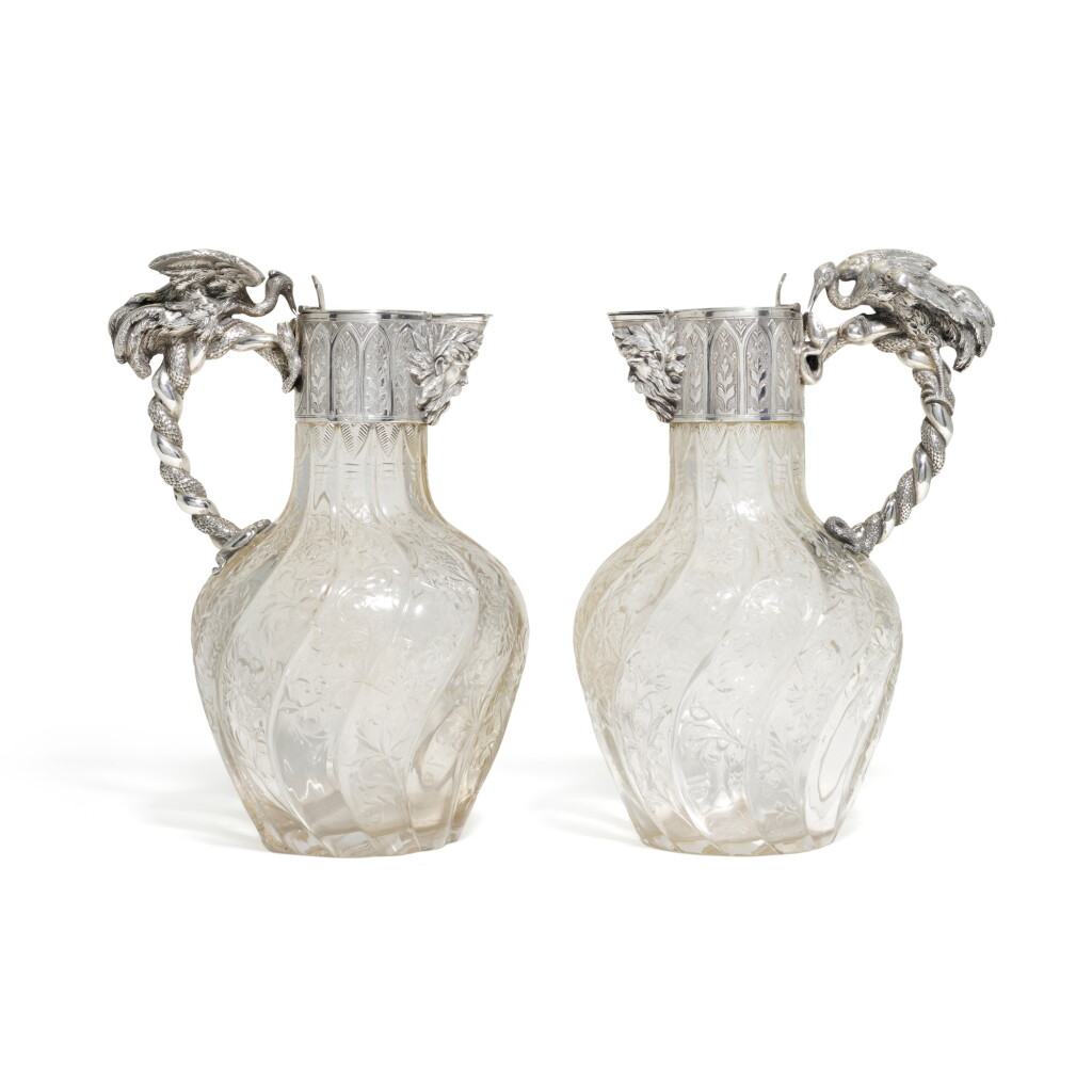 View full screen - View 1 of Lot 108. A PAIR OF AUSTRIAN SILVER MOUNTED GLASS CLARET JUGS, MAKER’S MARKS AND 1872-1922 VIENNA CONTROL MARKS.