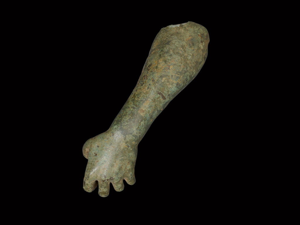 View full screen - View 1 of Lot 200. A Roman Bronze Left Forearm of a Child, circa 2nd Century A.D..