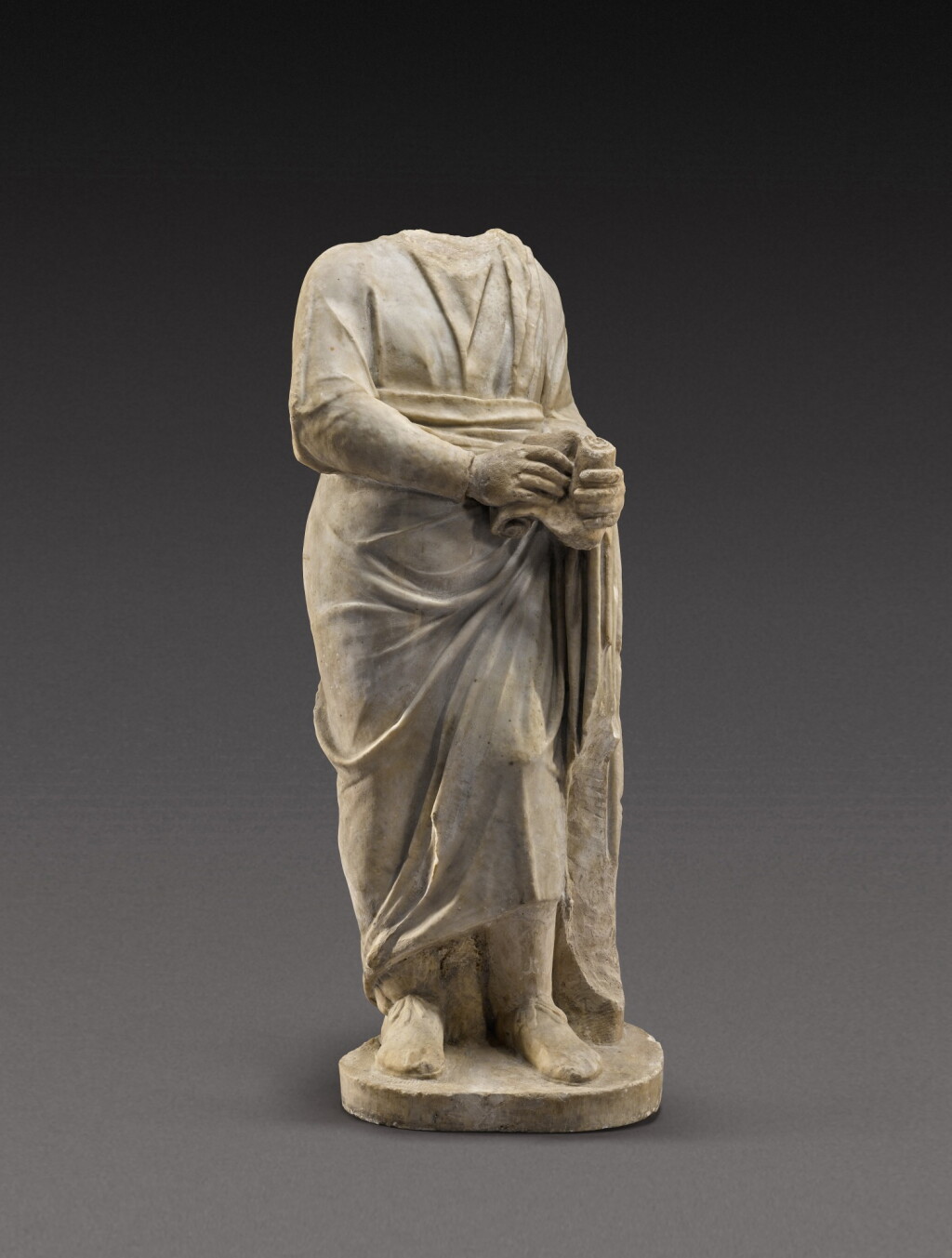 View full screen - View 1 of Lot 194. A Roman Marble Figure of a Philosopher or Man of Letters, circa 2nd Century A.D..